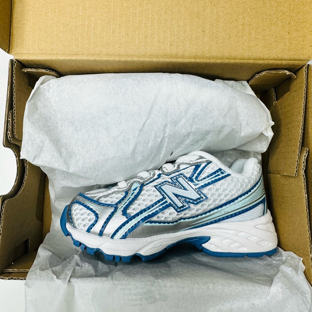 New Balance White and Blue Sneakers with Supportive Sole